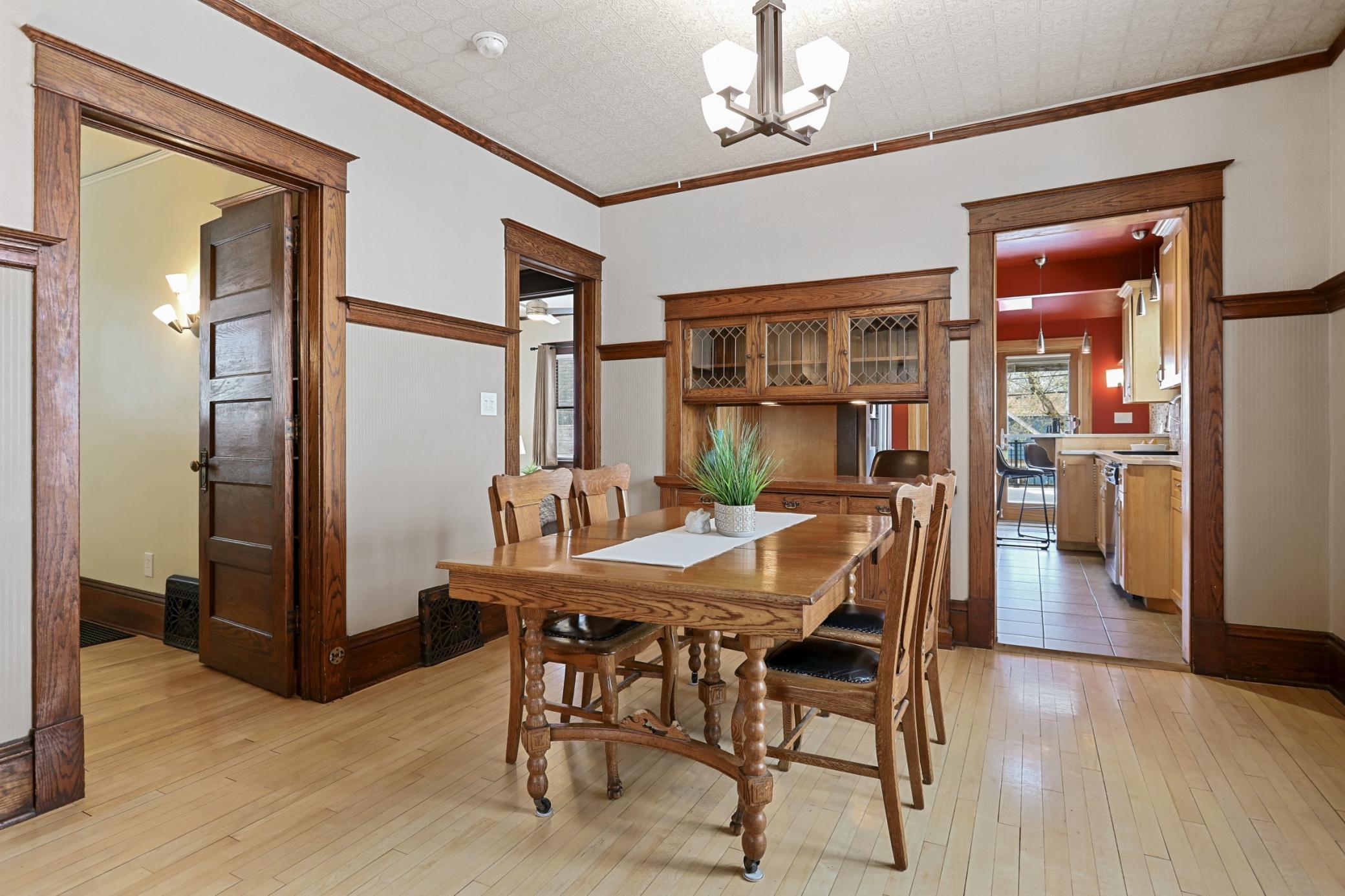 Gorgeous Woodwork in Dining Room, Featuring Built-in with Pass Through Into the Updated Kitchen!