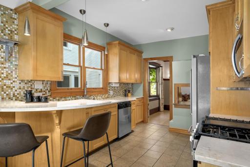The Updated Kitchen Features Plenty of Counterspace and a Breakfast Bar!