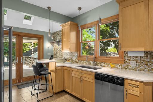 Check Out the Updated, Refreshed Kitchen! Easy Access from the Kitchen to the Back Deck and to the Dining Room!