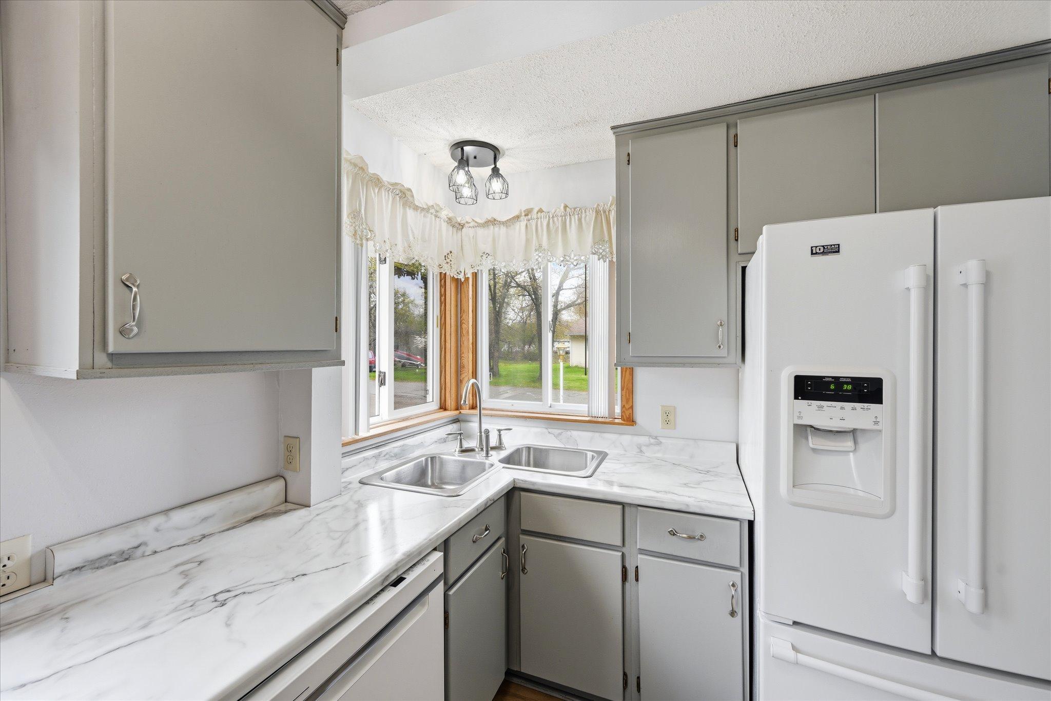 21-14649 283 1_2 Ave NW [3041113]- 021.jpg