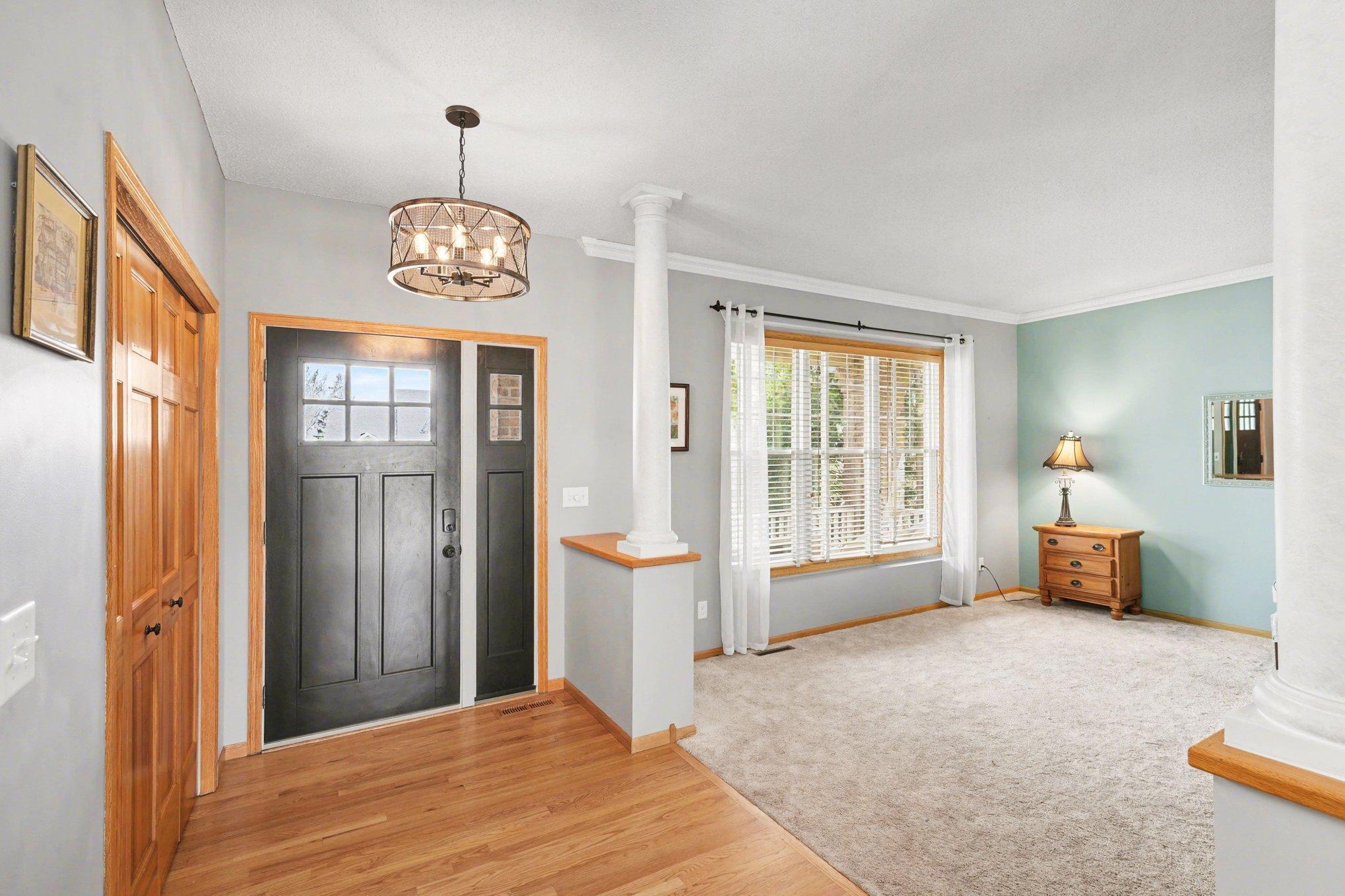 Entry area with coat closet.