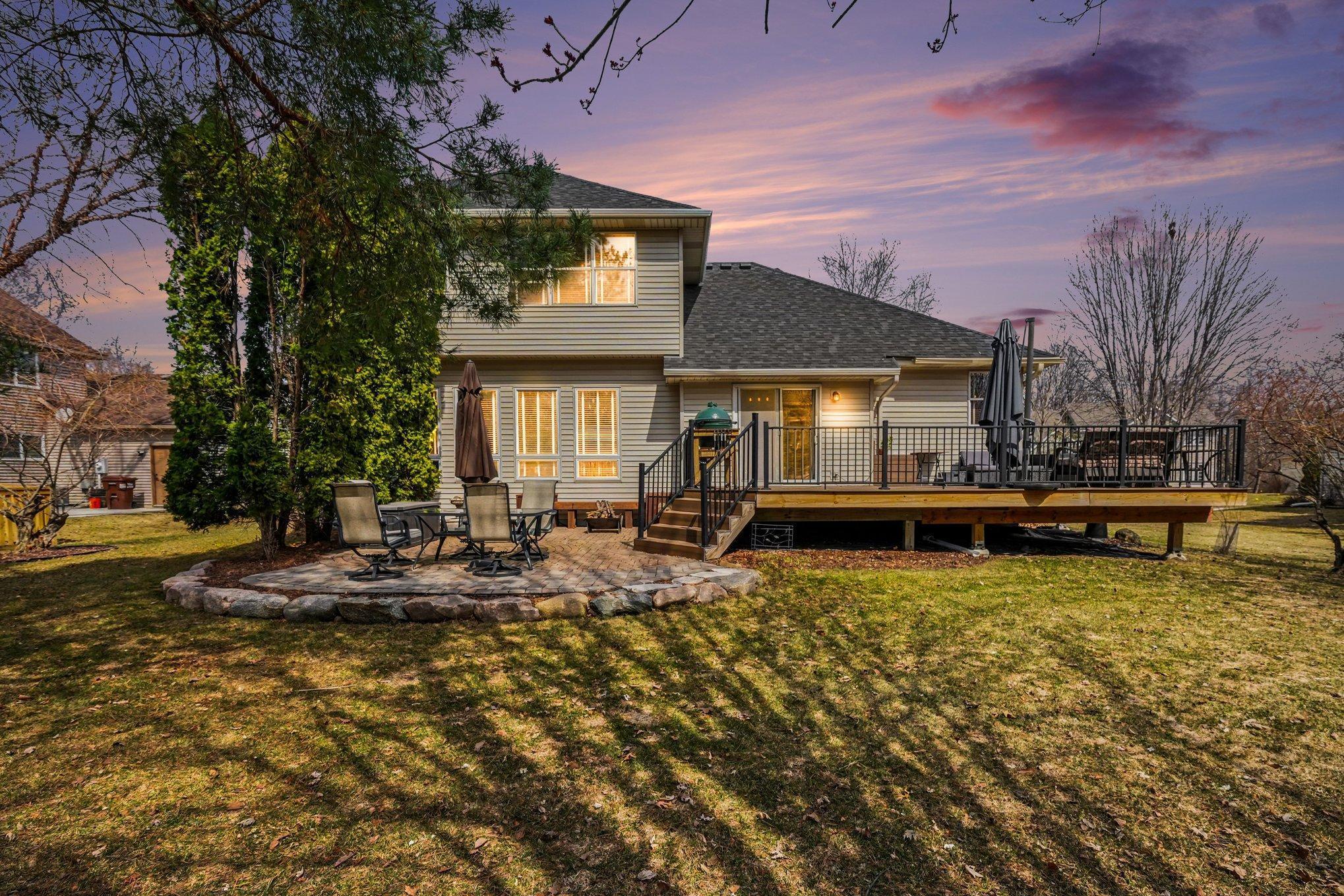 Spacious back yard with new large deck and patio space.
