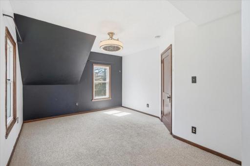 The primary bedroom with a large walk-in closet located upstairs