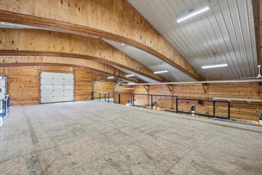 Hay loft with additional elevated garage door in second story makes life easier to bring in and store hay