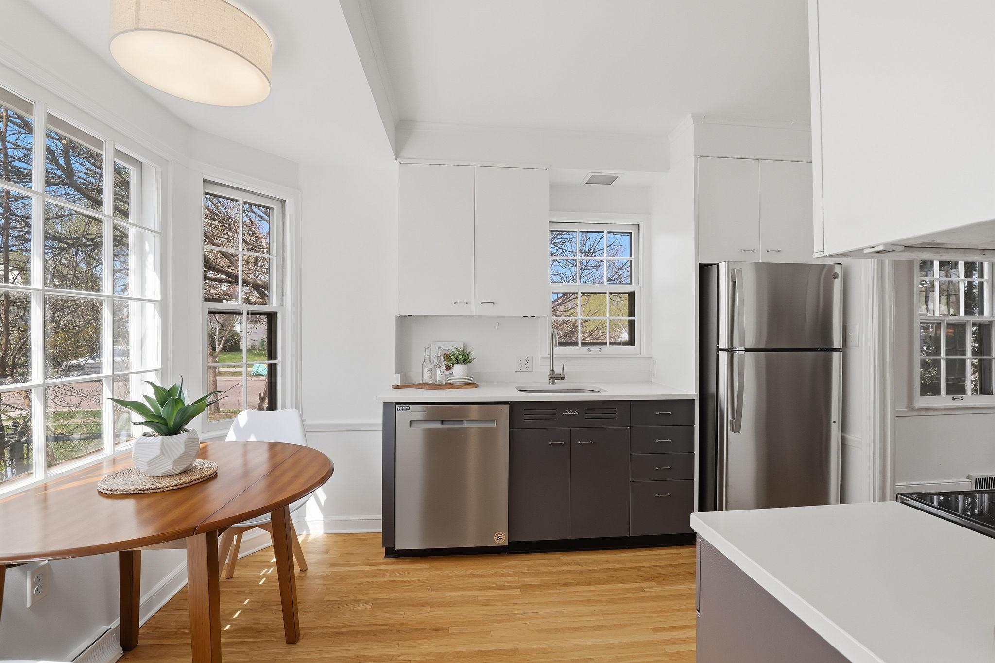 Eat-in kitchen with stainless appliances