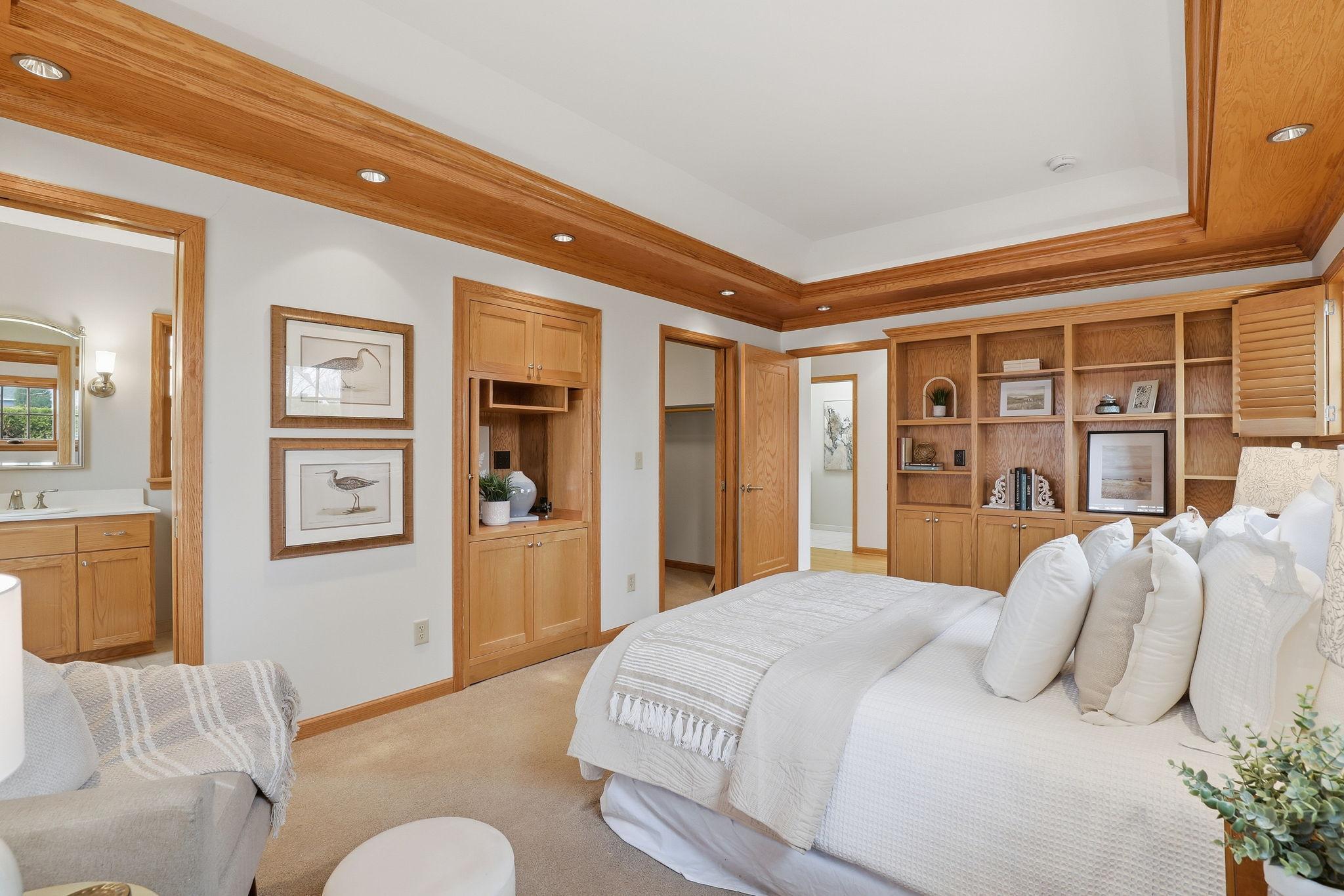 Main floor primary bedroom with 3/4 bath