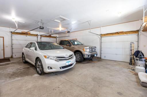 Attached insulated 2-stall w/ additional overhead door