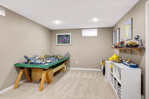 More open rec space. Previous owners have used this as a nice office space, these owners use it for the ultimate Lego display.