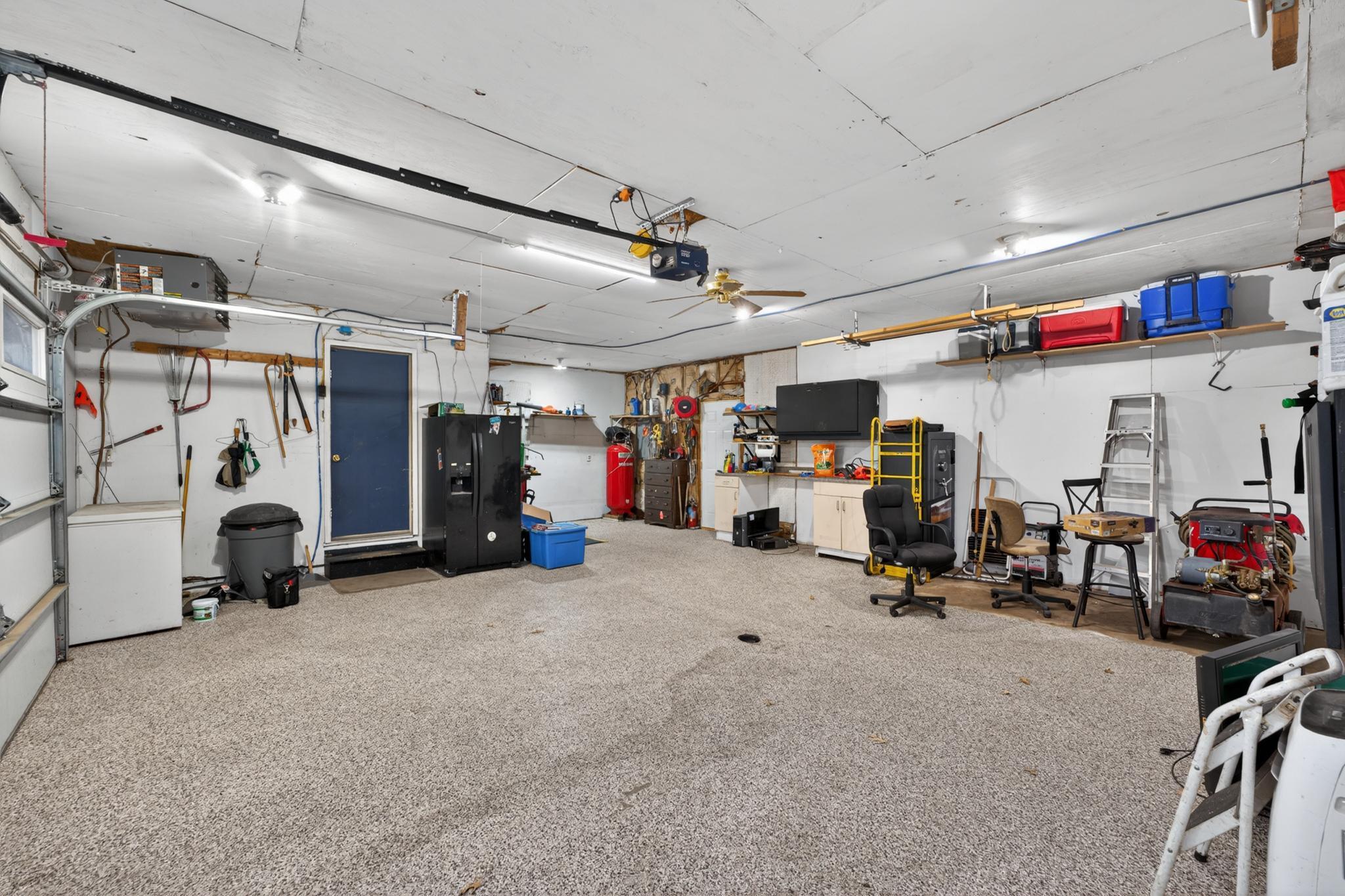 Attached Garage includes Fridge and AirCompressor