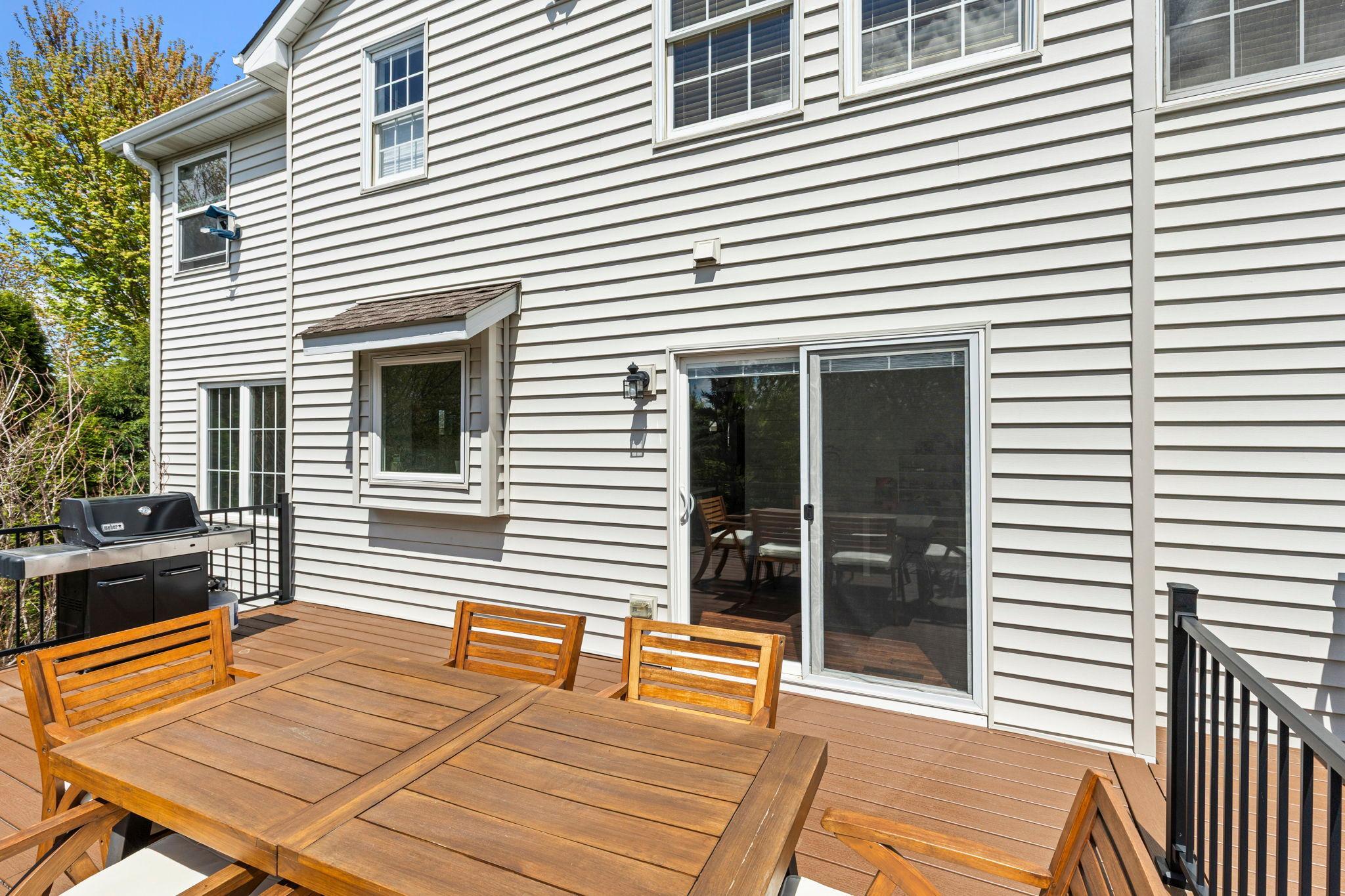 Sliding doors with built in blinds lead to the spacious deck
