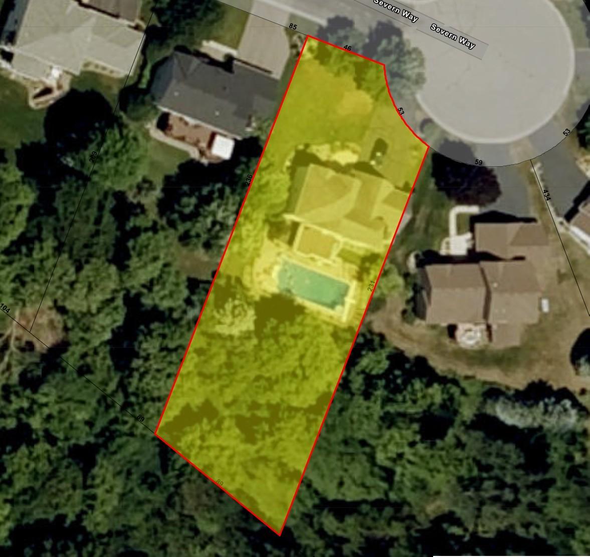 Property extends well past the pool into the woods