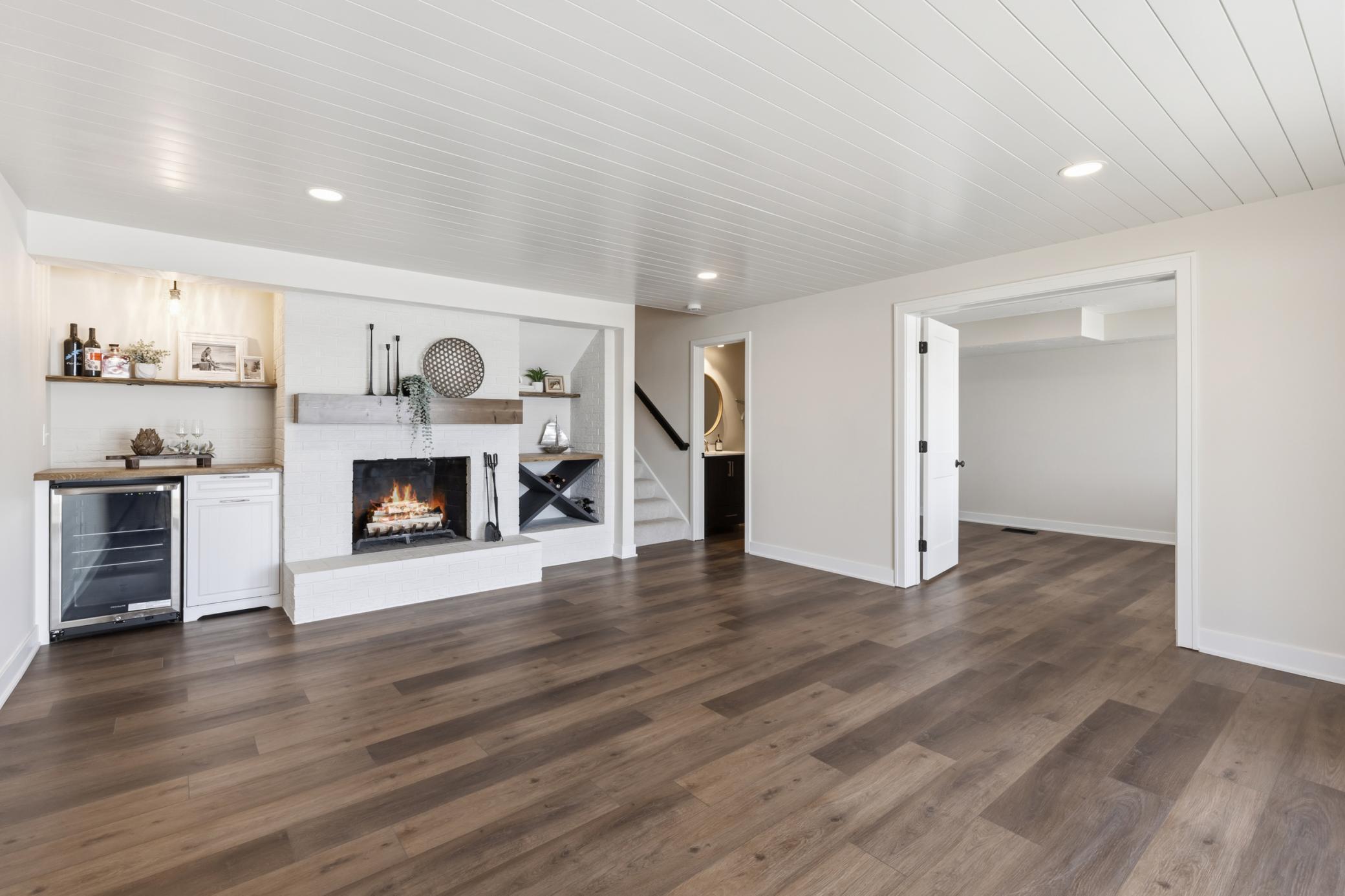 Family Room features wide open space, great for entertaining and play! Luxury vinyl plank flooring throughout!