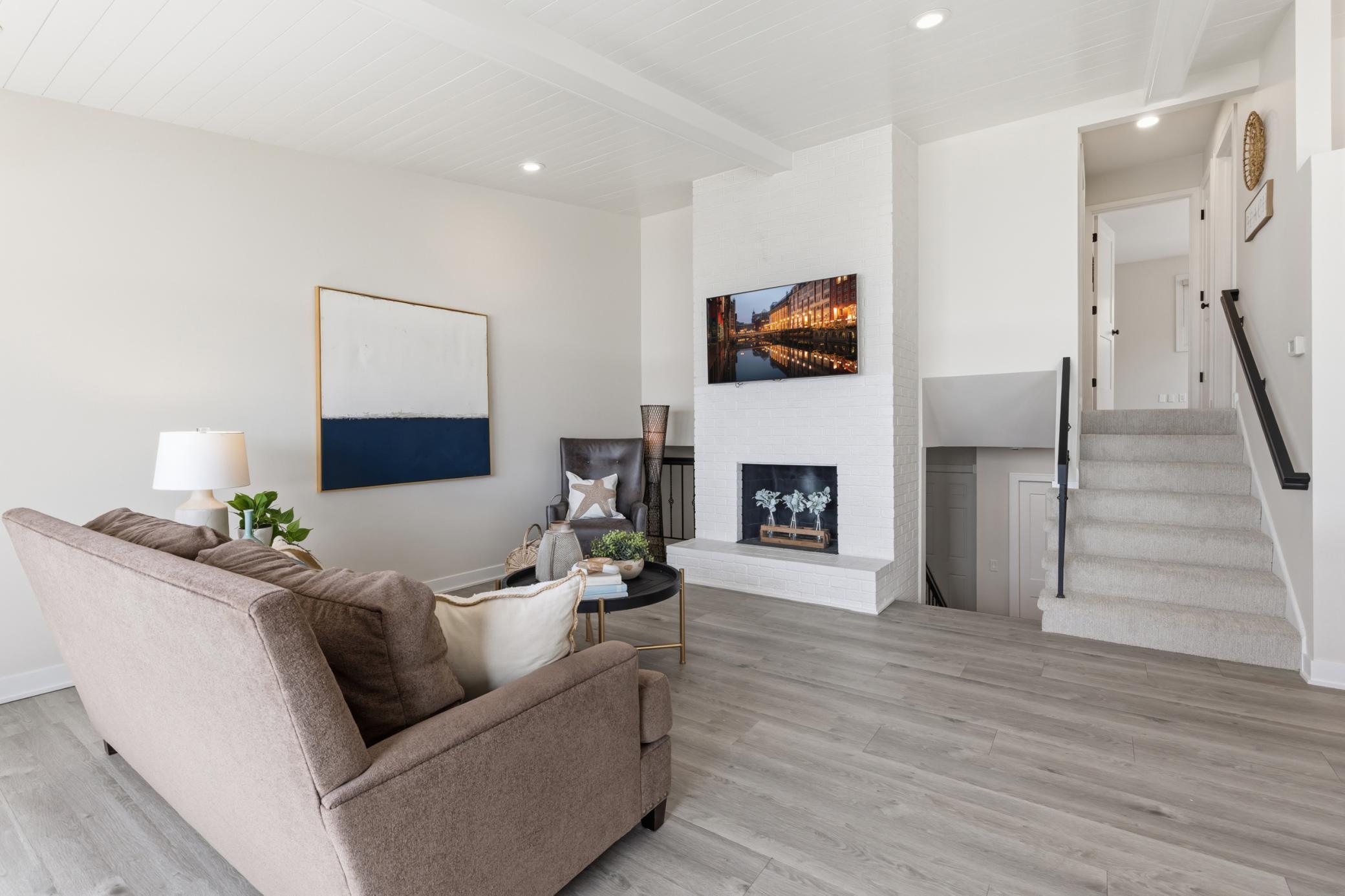 Stairs to the Upper Level ~ Upper Level features 2 bedrooms and 2 bathrooms.