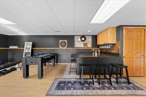 Wet bar in lower family room ready to entertain your guests.