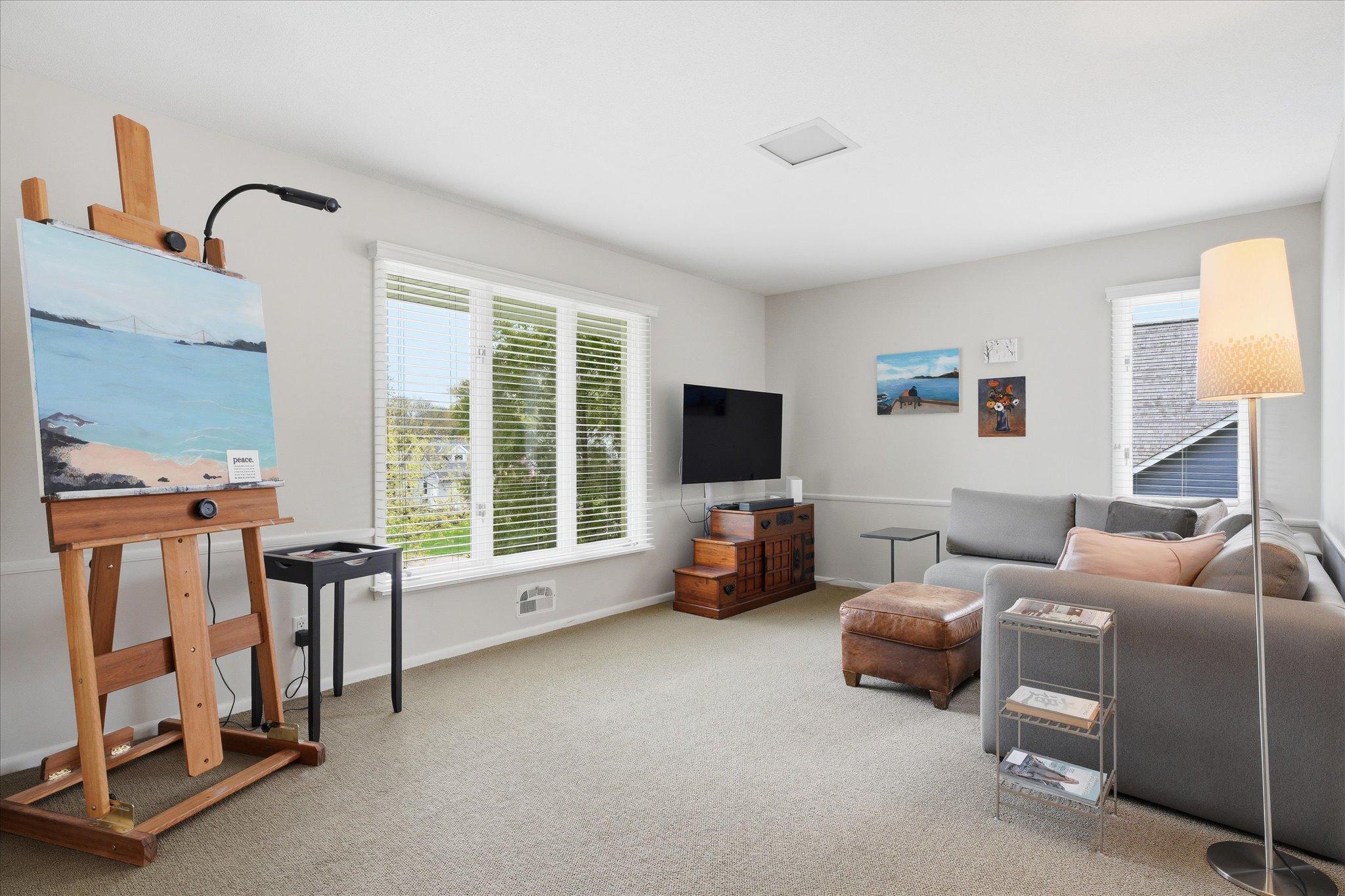 2nd bedroom on main level is used as a studio and tv room