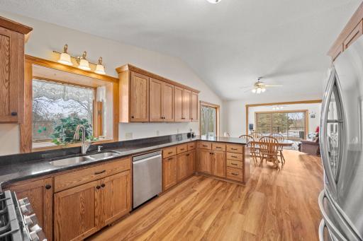 Custom Oak Cabinets, Granite Countertops with drop-in sink