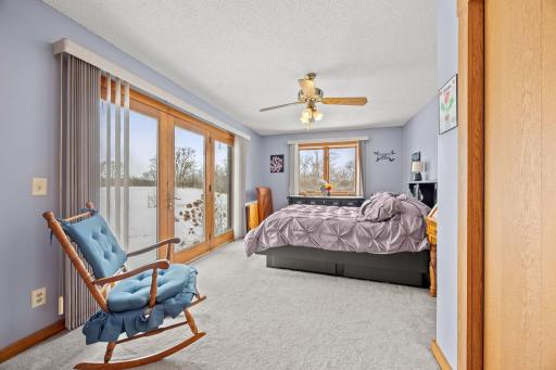 Primary Bedroom with full bathroom and access to future deck or patio