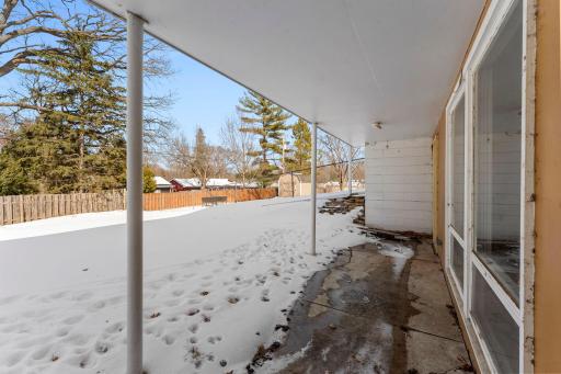 The walkout covered patio—ideal for morning coffee or gatherings.