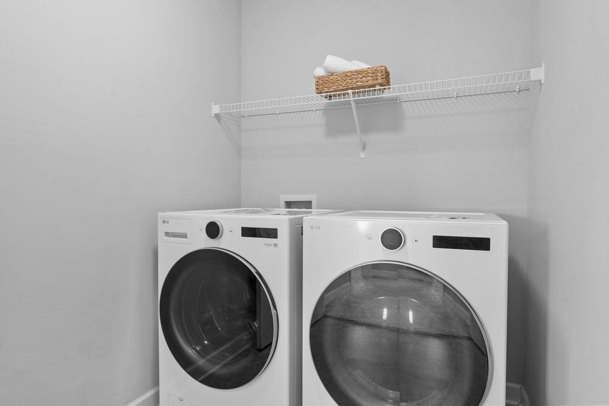 A conveniently located upper-level laundry room completes this floor.