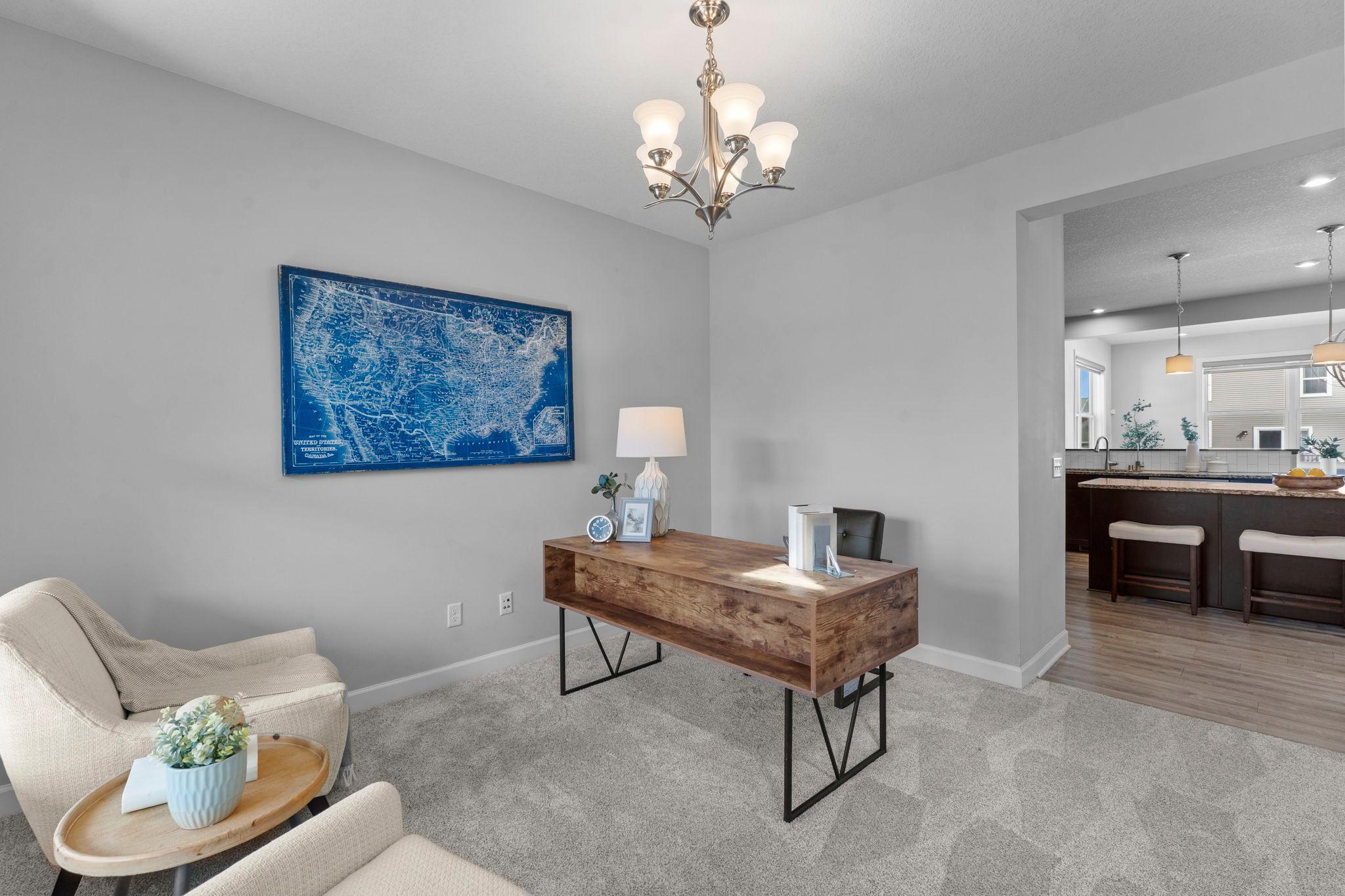 Another view of the main-level flex room, conveniently accessible from both the kitchen and foyer.