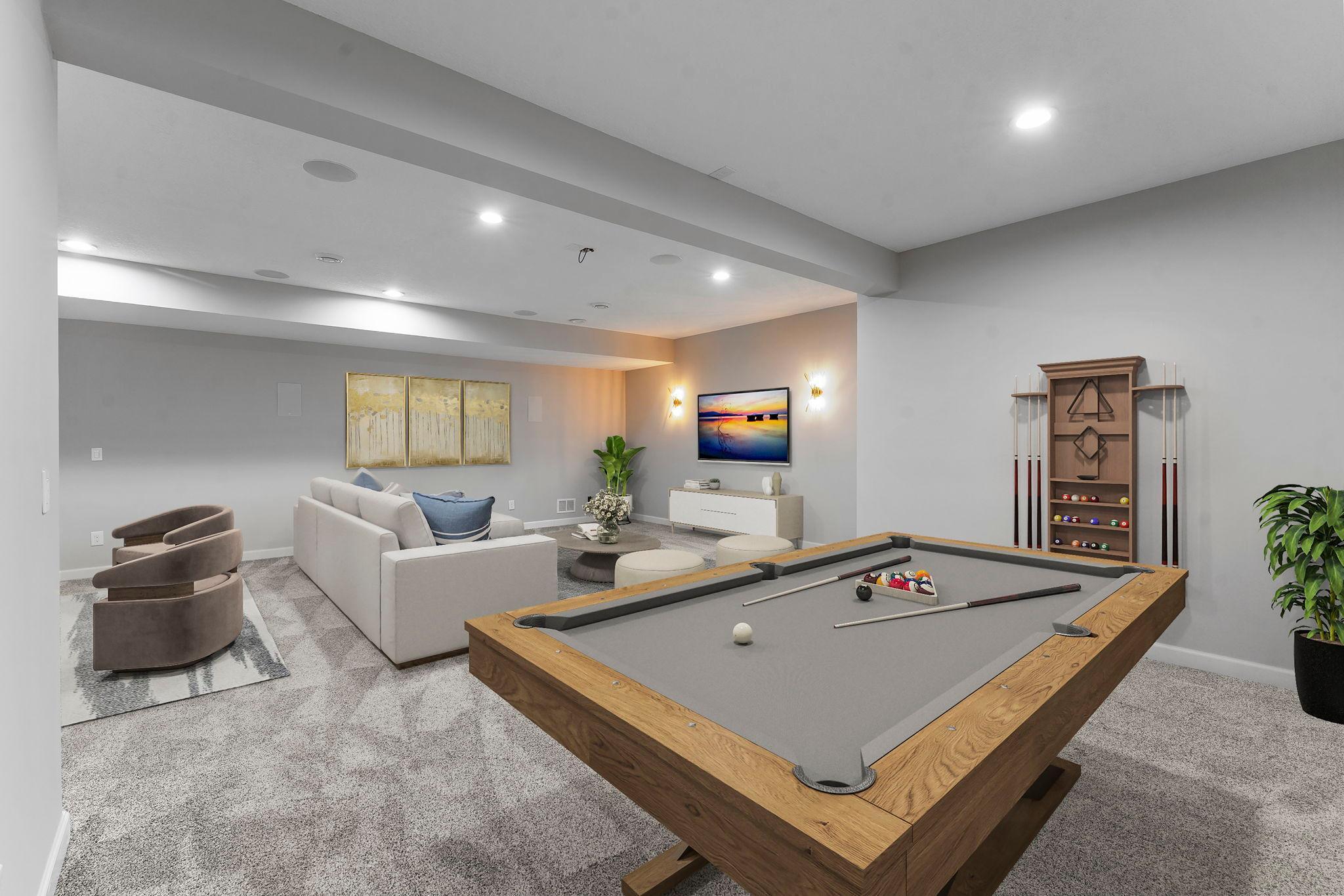 Another perspective of the lower level family room. (This photo is digitally staged)