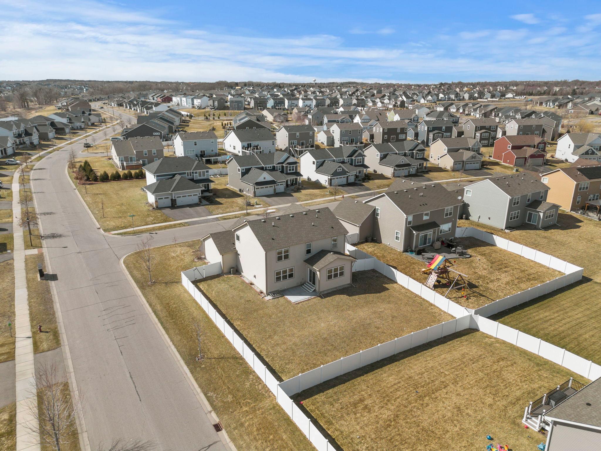 Situated on a desirable corner lot, the property boasts one of the largest backyards in the neighborhood.