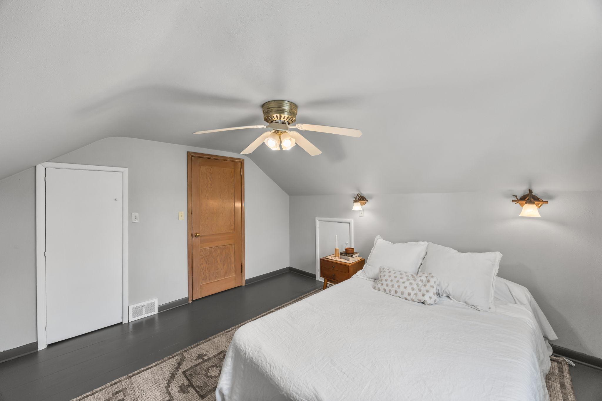 Another perspective of the upstairs primary bedroom.