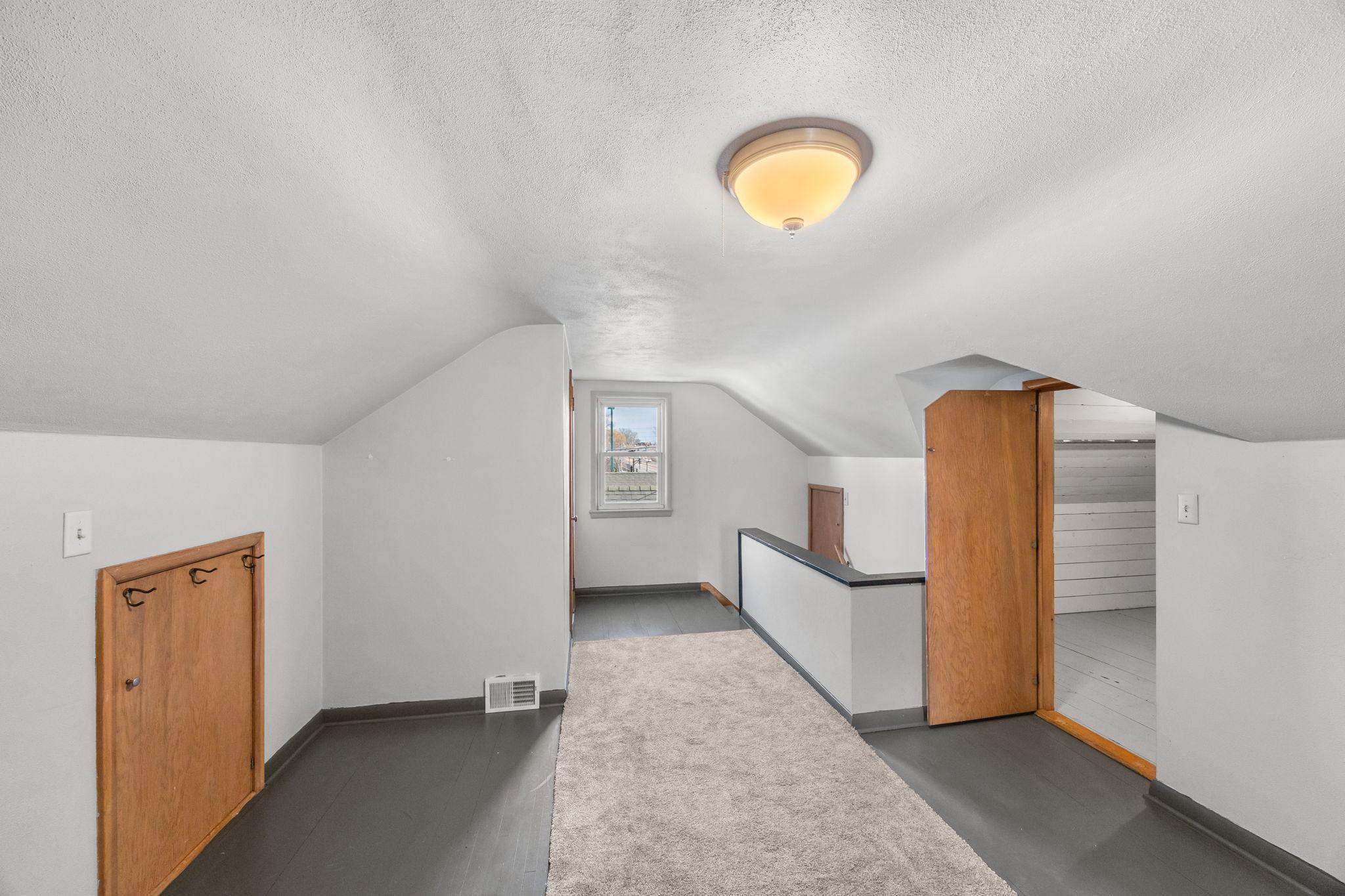The primary suite also includes abundant storage, featuring a 10x10 walk-in closet, two additional closets, and a clean, well-lit crawl space.