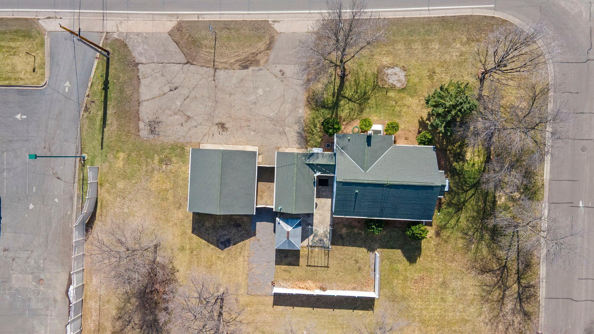 An aerial view showcasing the home and its spacious lot.