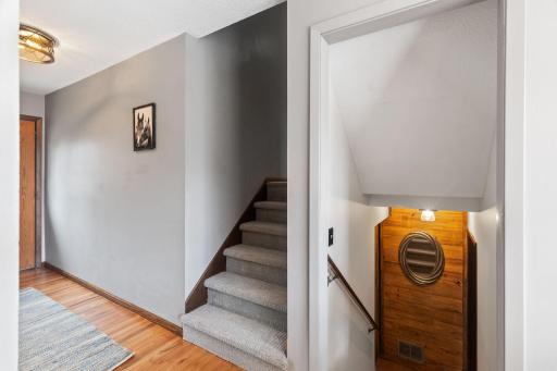 Step upstairs to the bedrooms or down to the family room.