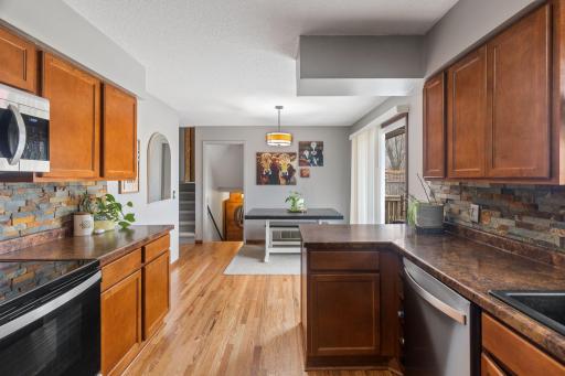 The dining room is adjacent to the kitchen