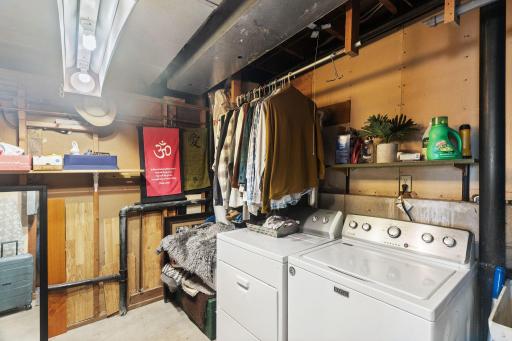 Laundry/utility room is located in the lower level.