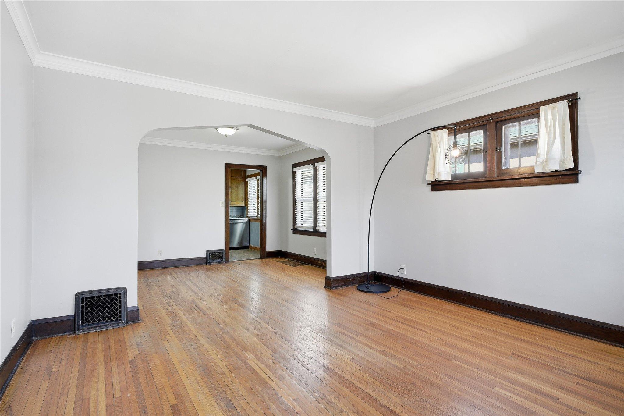 Unit one living room to dining room.