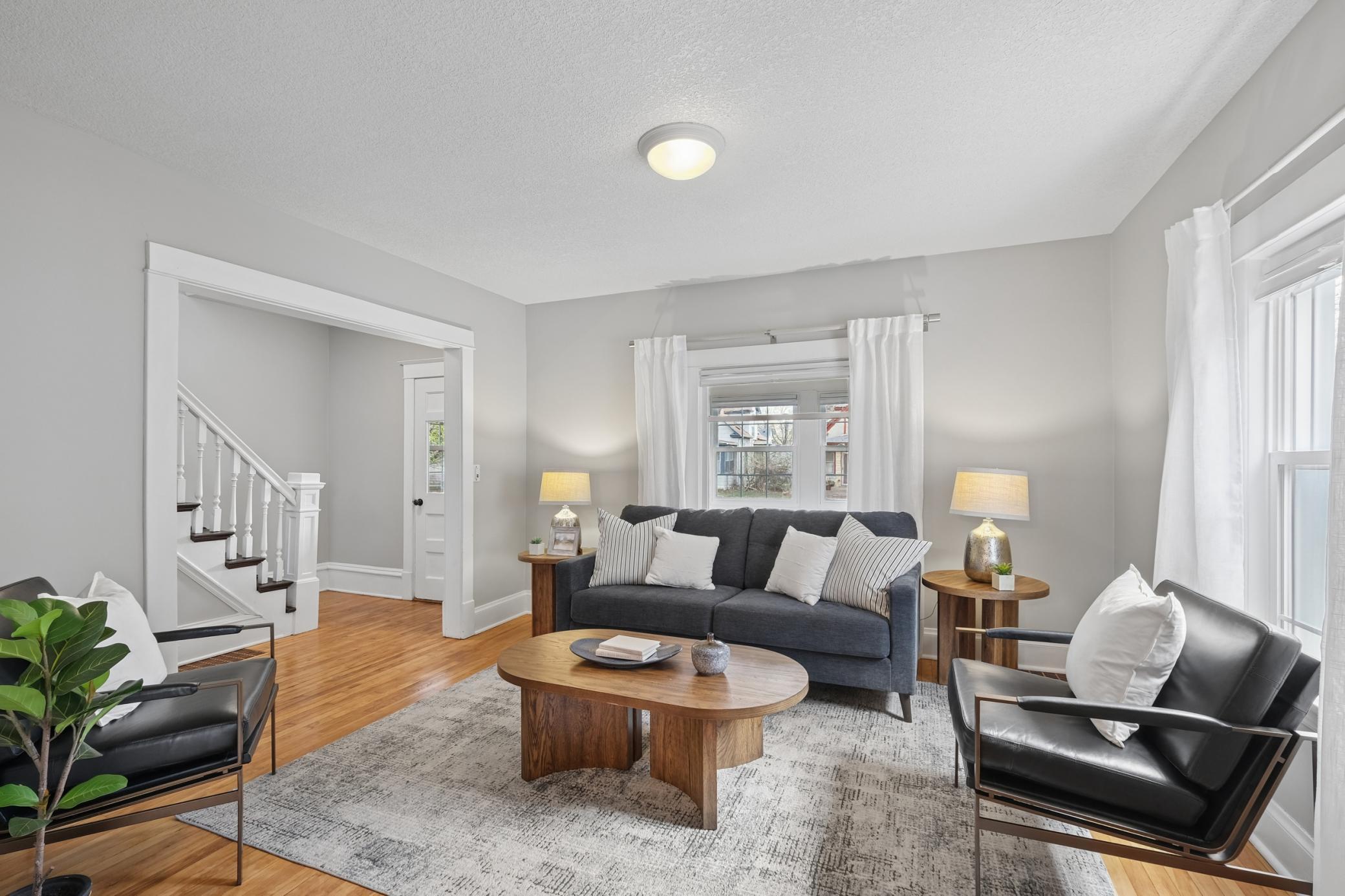 Spacious living room with hardwood floor