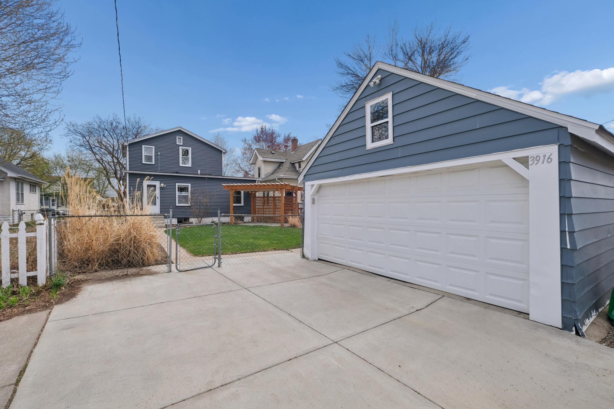 2 car garage and concrete driveway