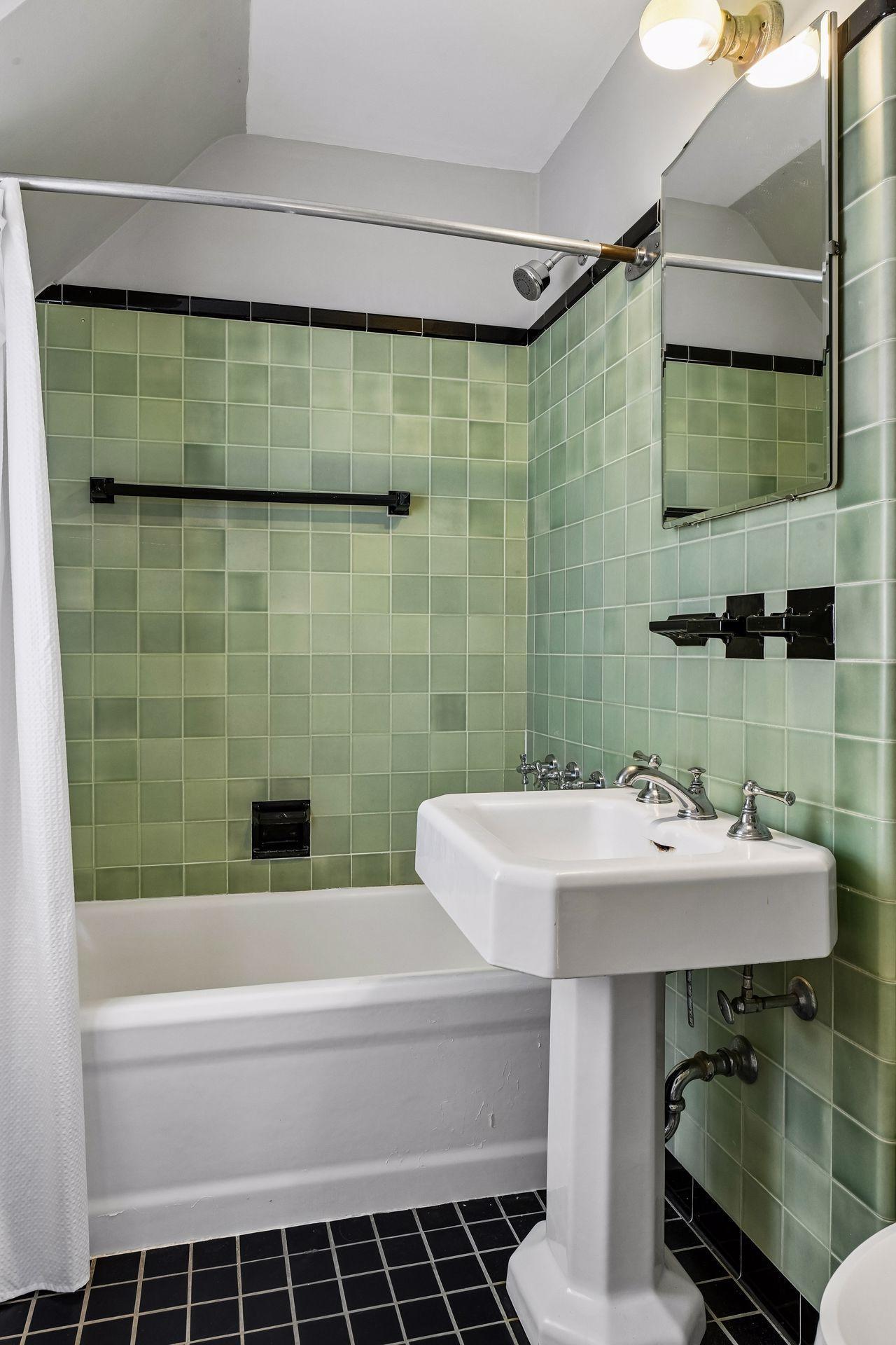 Full bath with original tile