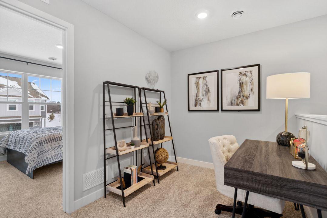 Venture upstairs to find flexible loft space perfect for a home office or whatever you choose! Photo of model home. Colors and options may vary.