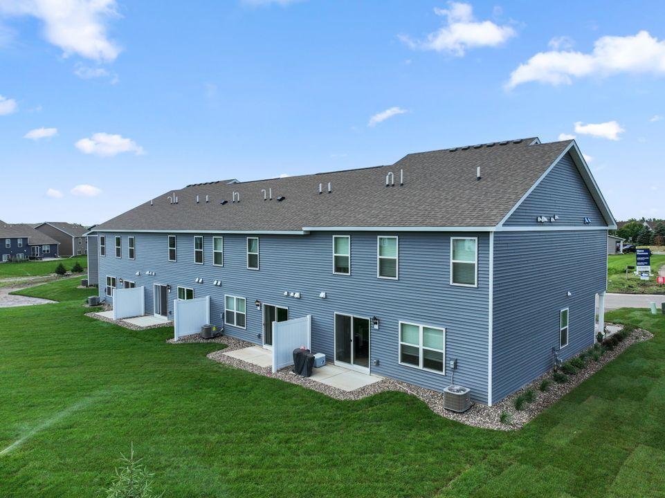 Rear of homes at Ardan Place in Rosemount. Every home has a private patio.