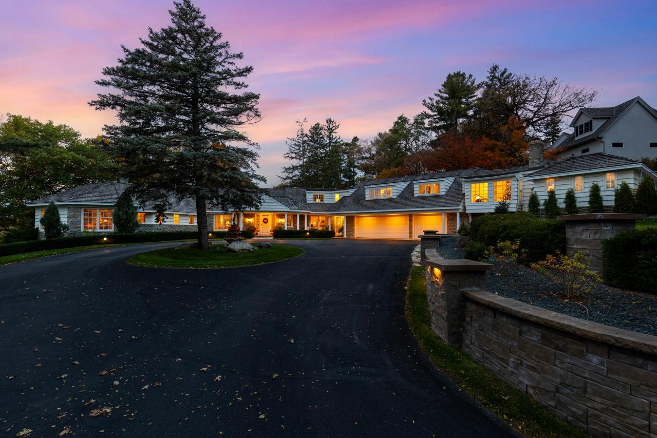 A true private retreat on Bryant Lake—this is luxury lakeshore living at its finest.