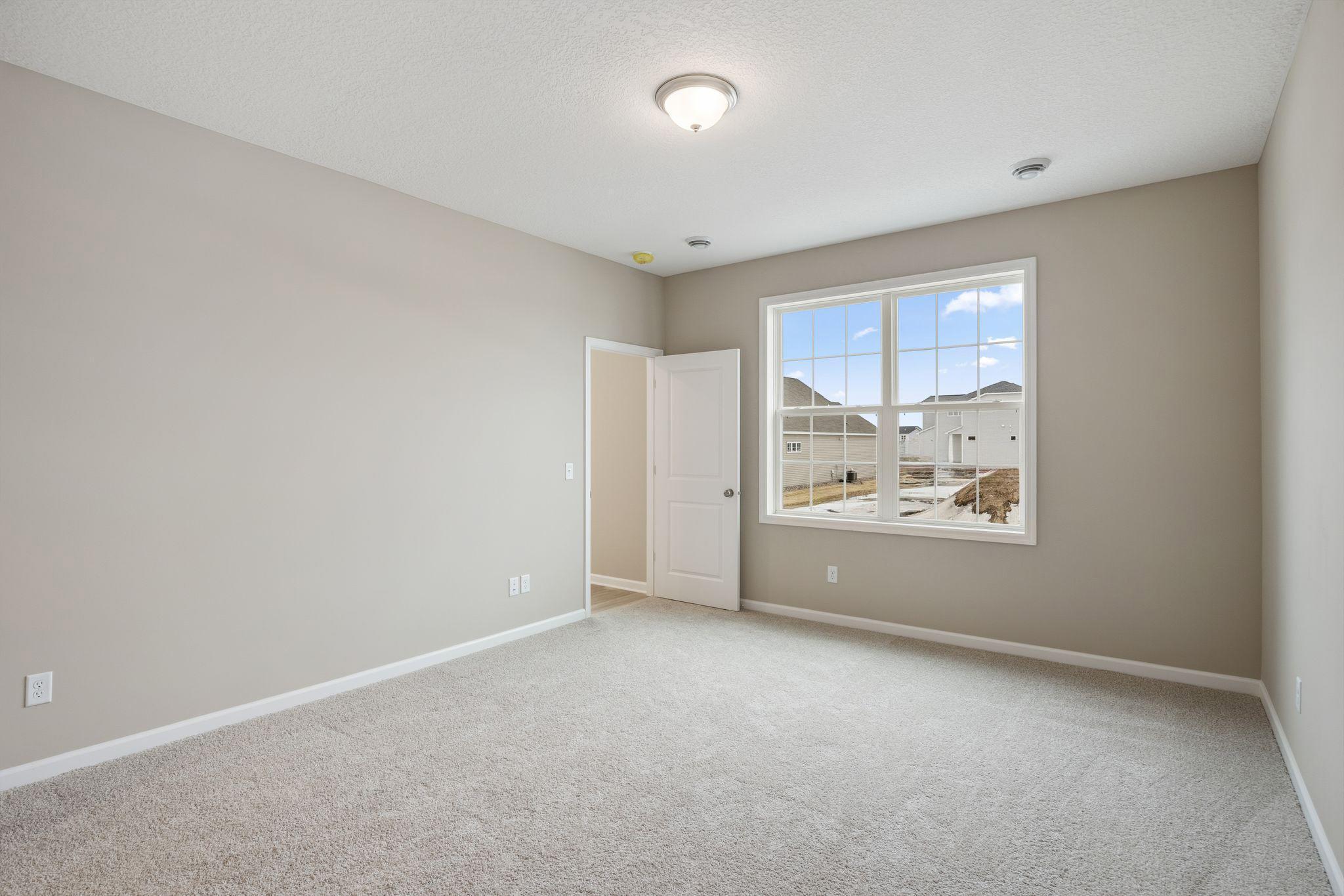 Owner's spacious main floor bedroom