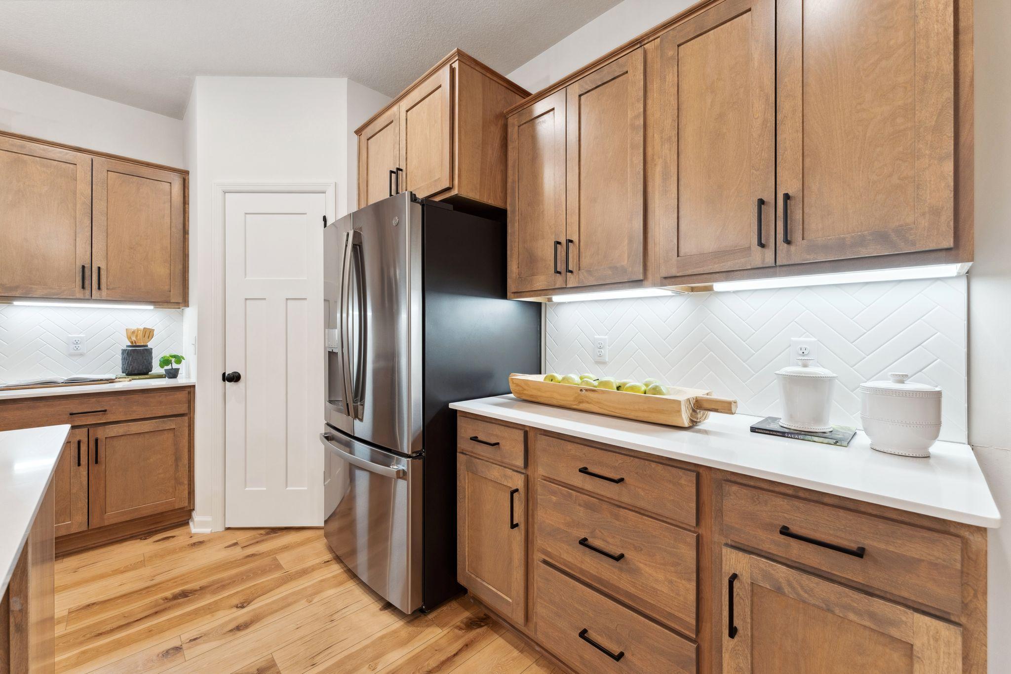 Kitchen - staged model - showing for representational purposes only, Finishes will be different.