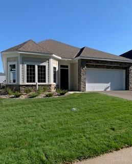 Cedarwood with new landscaping/grass/driveway