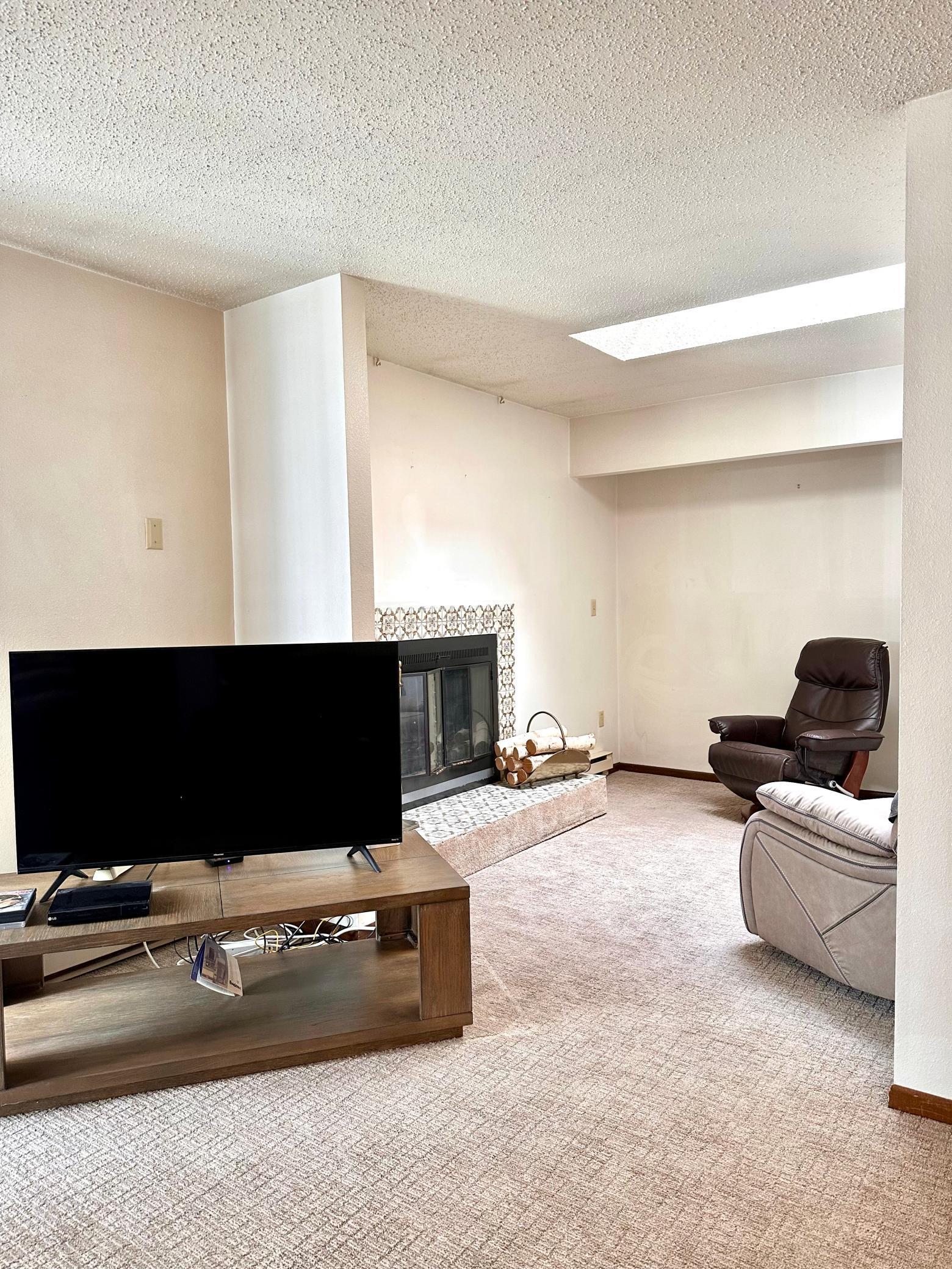 Living room looking into flex space