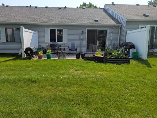 Back of home during the summer