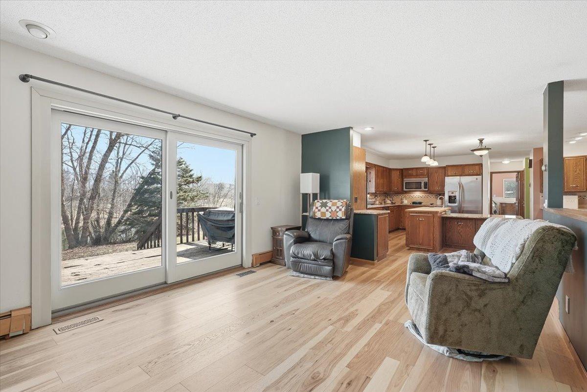 Living room with a view in the back of the home