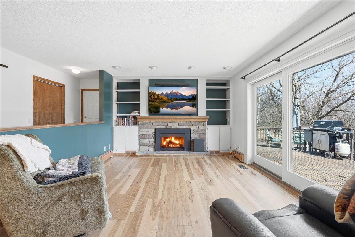 Cozy living room. Check out the fireplace!