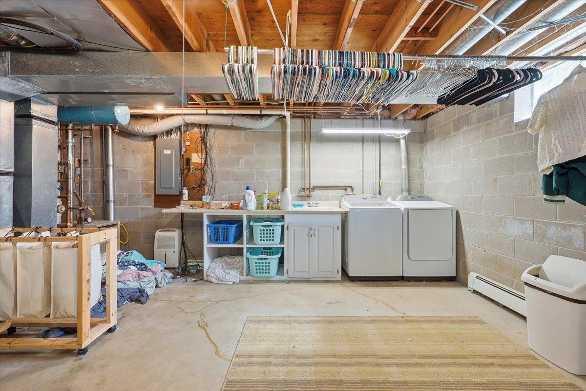Huge laundry area with storage