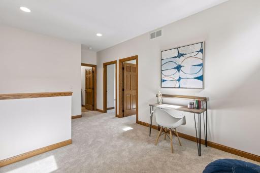 Upper level loft walks to two bedrooms and full bath