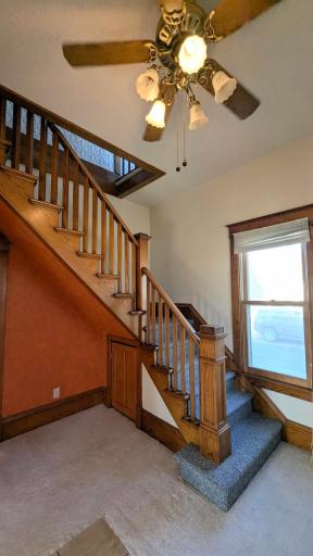 Formal Foyer with stairs leading to the upstairs.