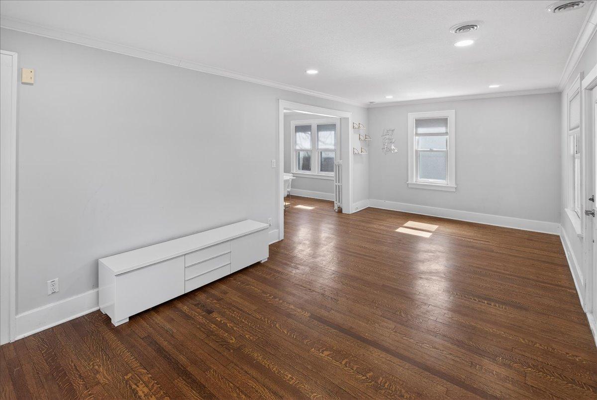 Large living space and entry into the dining area.